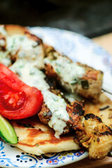 Grilled chicken shish tavuk and naan.selective focus