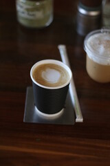 coffee paper cup on the wooden table