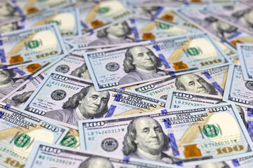 US dollars banknotes, paper currency for background, selective focus. Concept of american and global economy, exchange rate