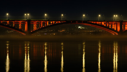 Naklejka na ściany i meble Night city lights, river, bridge