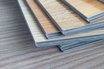 Naklejka na ściany i meble Examples of ready-made vinyl flooring for interior work.