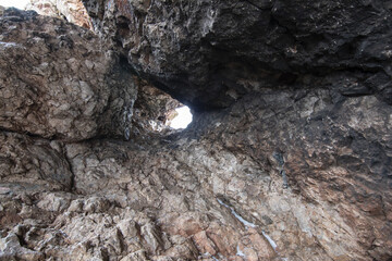 Rocks with through holes