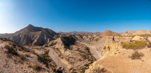 Panoramic in the curve of the path of the desert canyon of Tabernas, province of Almería, Andalusia. On a trek in the Rambla del Infierno