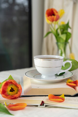 still life with tulips and herbal tea