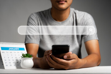 Man using phone searching browsing internet data Information with search bar icon. Networking concept