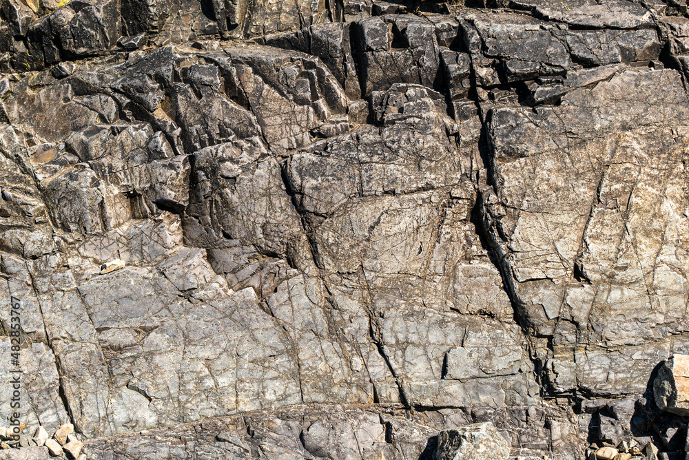 Poster a closeup shot of rocky hill