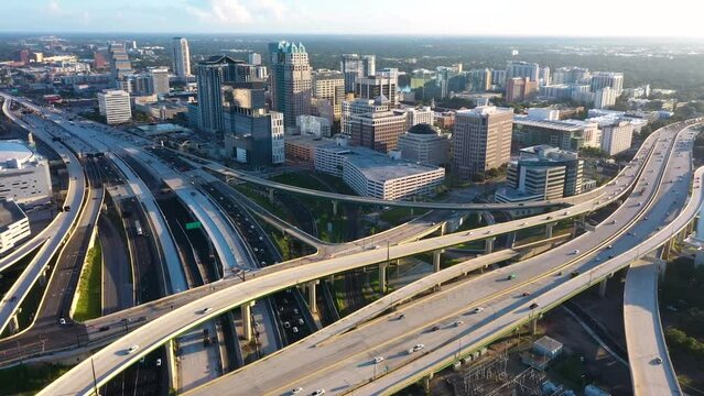 Epic aerial drone establishing shot over the 408 expressway and I-4 in downtown Orlando, FL.