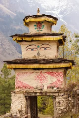 Papier Peint photo Manaslu Stupa in the Manaslu region in the Himalayas with mountains in the background