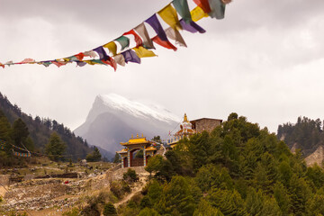 View of a village and a monastery in the Himalayas in the Manaslu region