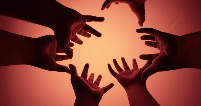 Close-up shot of a hand reaching out, Red scene.
