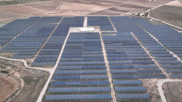 Renewable energies. Photovoltaic panels. Extension of solar panels, aerial drone view. Hasselblad camera 4K