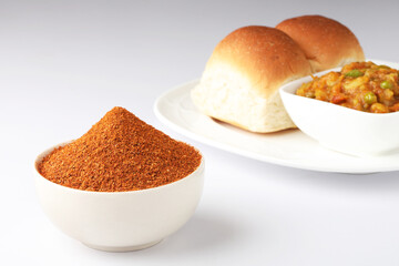 Pav Bhaji Masala Curry Powder with Mumbai Style Pav bhaji is a fast food dish from India, consists of a thick vegetable curry served with a soft bread roll, served in a plate