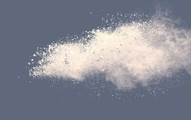 Abstract multicolored powder splatted on brown background, Freeze motion of white powder exploding. grey dust.