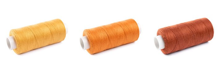 Sewing threads. Spool of thread with on white isolated background. Multicolor sewing threads background.