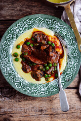 Rabbit liver stew with mushrooms.style rustic