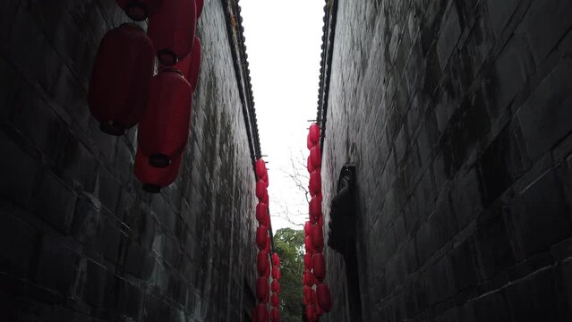 Narrow alley with Chinese lanterns in Jinli public touristic area, Chengdu, Sichuan province, China