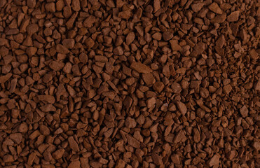 Instant coffee as background. Instant coffee close-up, top view. 