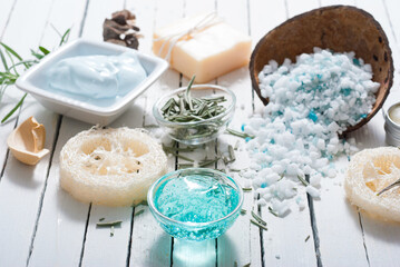 skin care, hygiene products with lavender leaves on white wood table