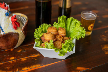 Delicious Food Contemporary Classic Dish Plate Menu Lunch Dinner Chicken BBQ Pork Sausage Bacon Regional Native Dessert on a WoodenTable