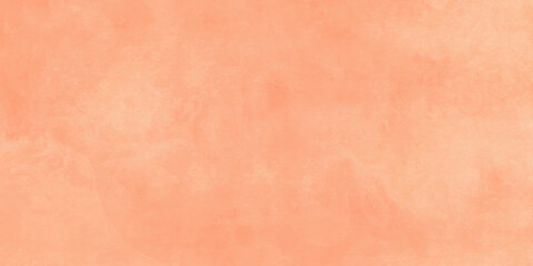 Texture of orange decorative plaster or concrete. Abstract background for design. Art stylized banner with copy space for text. Pastel Orange stucco wall textured background