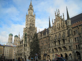Fototapeta premium Beautiful old town hall exterior. Winter cityscape of Munich, Germany. Street in the city.