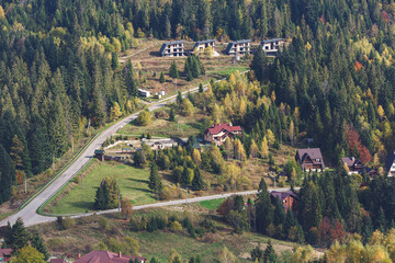 Small resort town in forest in mountains