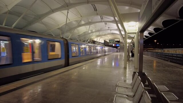 Subway train leaving the station platform, Munich-Froettmaning, Germany