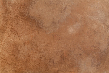 Background with decorative plaster. Brown color.