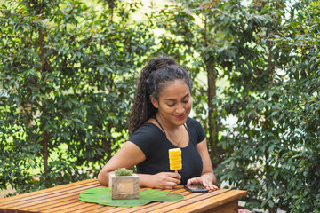 Young woman in the city enjoying an ice cream.