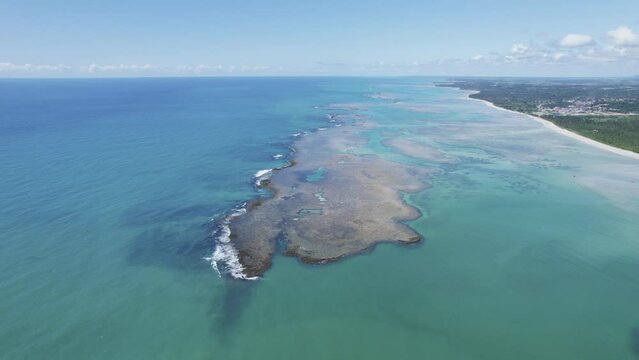 Aerial view of reefs of Maragogi, Coral Coast Environmental Protection Area, Maragogi, Alagoas, Brazil. 4K.