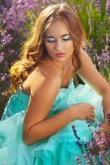 Fototapeta na wymiar model in gown relaxing