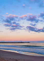 Obraz premium Beach scene: Seascape at sunset.