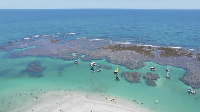 Aerial view of Porto de Galinhas beaches, Pernambuco, Brazil. Natural pools. Fantastic vacation travel. Great beach scene. 4K.