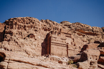 Facades in the rock in the ancient city of Petra. Hashemite Kingdom of Jordan. Jordan. Petra