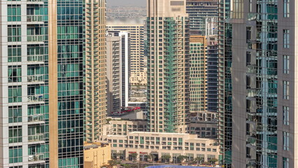 Fototapeta na wymiar Aerial cityscape timelapse with modern architecture of Dubai downtown.