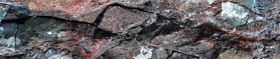 Banner Texture of natural stone rock, background wallpaper white, gray and black splashes on the surface. Horizontal rectangular photography