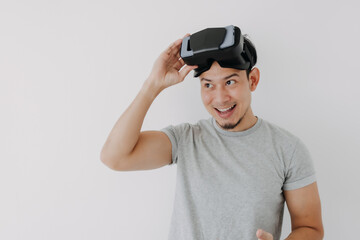 Happy Asian man present virtual glasses application for metaverse technology.