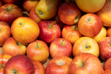 Delicious red apples as background