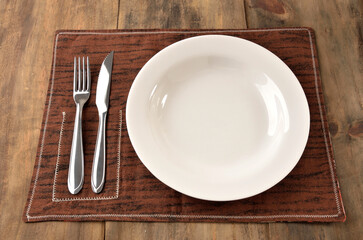 empty plate served at the table