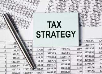 Tax strategy concept. Word on paper. Accounting