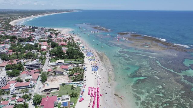 Aerial view of Porto de Galinhas beaches, Pernambuco, Brazil. Natural pools. Fantastic vacation travel. Great beach scene. 4K.