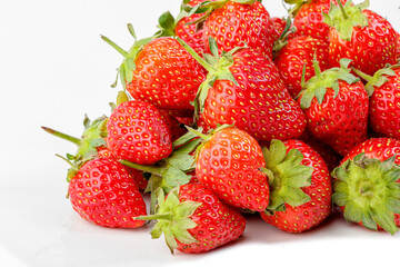 beautiful and ripe red strawberries on a white background