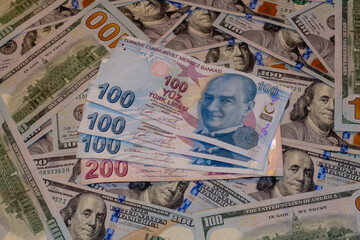 Turkish lira and American one hundred dollar banknotes	