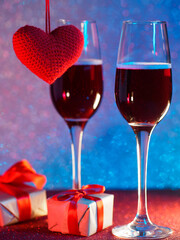A surprise for Valentine's Day. Romantic dinner. neon bright bokeh background