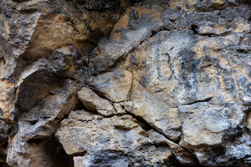 Natural natural stone, stone tunnel of a mountain river ,inert material used for construction work and decorative decoration, close-up.