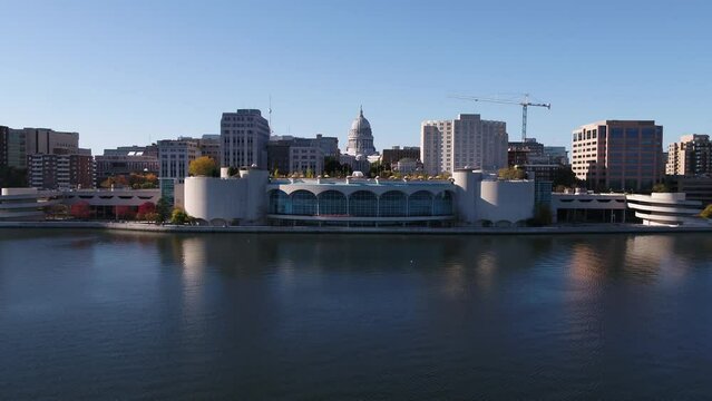 Drone Flying Towards Madison State Capitol Building from Lake Monona (Push In Raise Altitude)