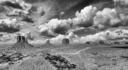 Black and white sunset over Monument Valley, a region of the Colorado Plateau between Arizona and...