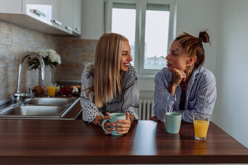 Young lesbian couple enjoying morning at home