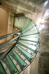 Fototapeta premium Geometric view of modern staircase by looking upwards.