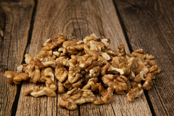 Walnuts on a wooden background.A natural protein product.